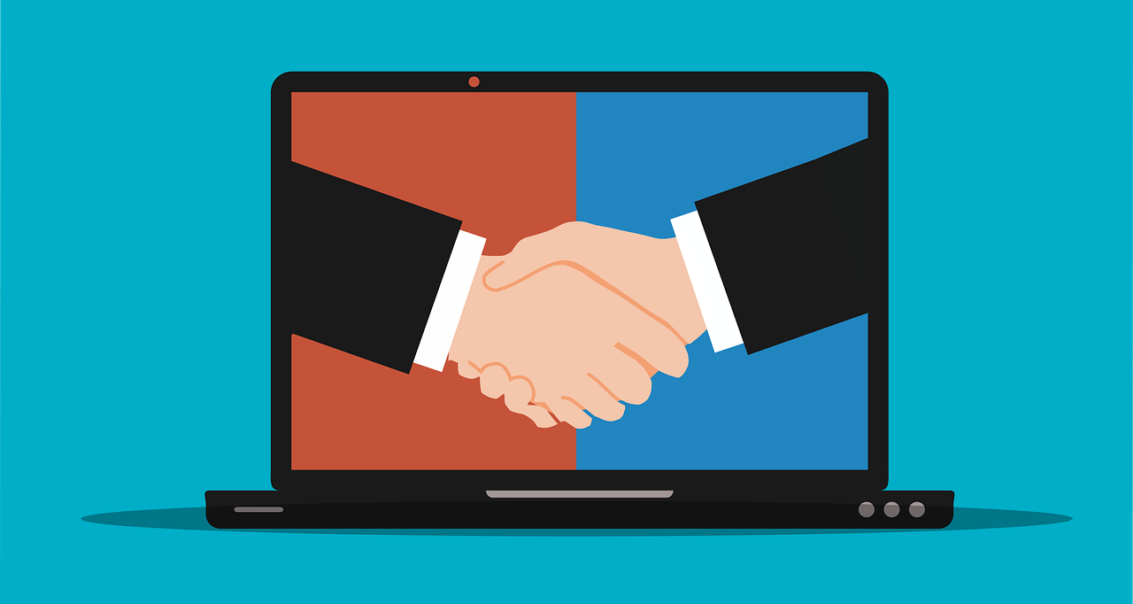 confiance-numerique-poignee-mains-ordinateur-digital